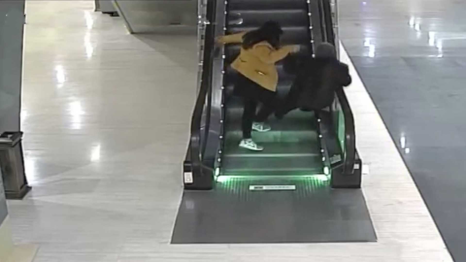 Old Lady Falls Down Escalator