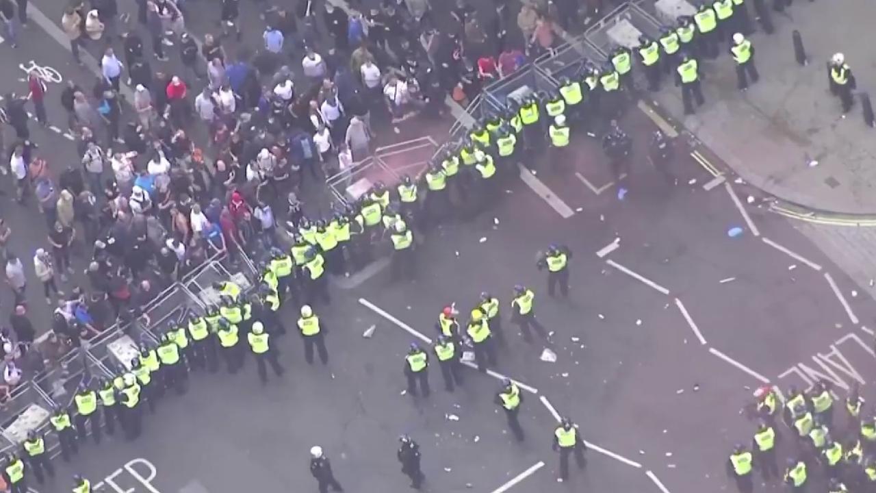 Over 100 arrests after violent clashes at far-right linked UK protest ...