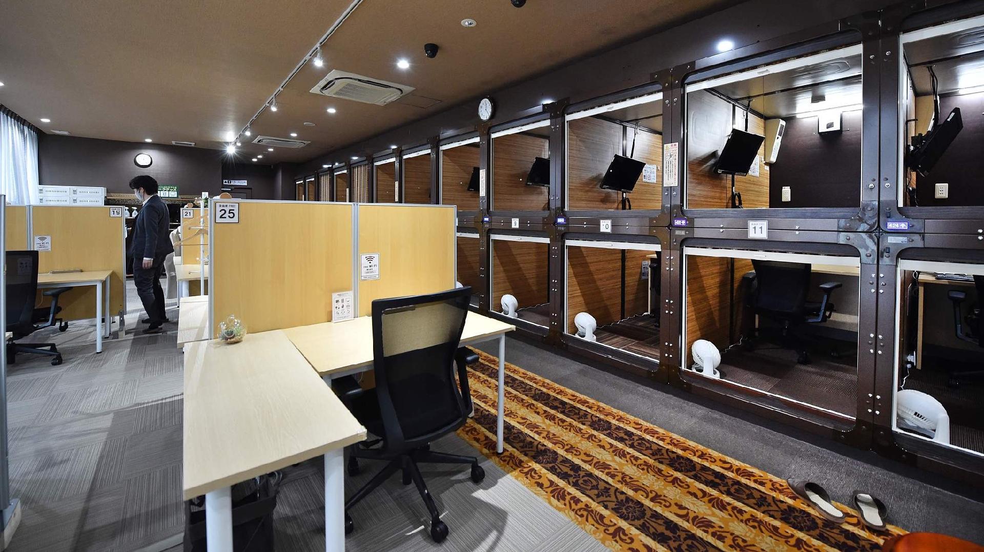 Japanese capsule hotels reinvent themselves as 'capsule offices' CGTN