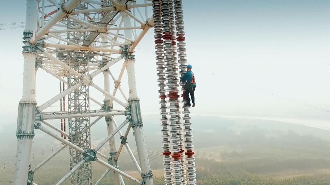 Men of the People Lineman working on ultrahigh voltage grid CGTN