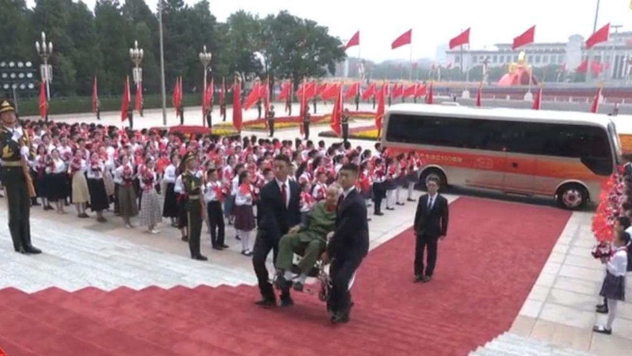 Medal awardees welcomed at the Great Hall of the People - CGTN