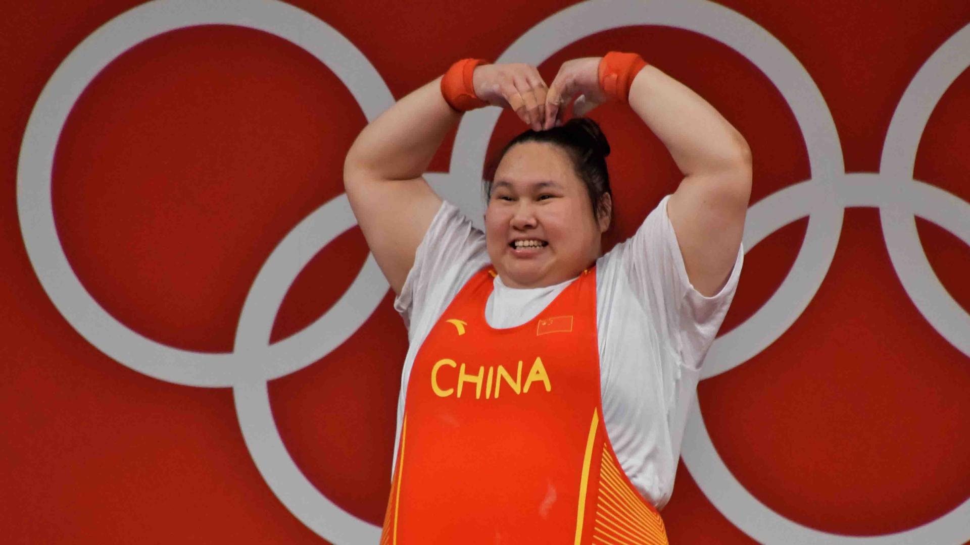 Strong, but cute China's weightlifting star Li Wenwen wins hearts CGTN