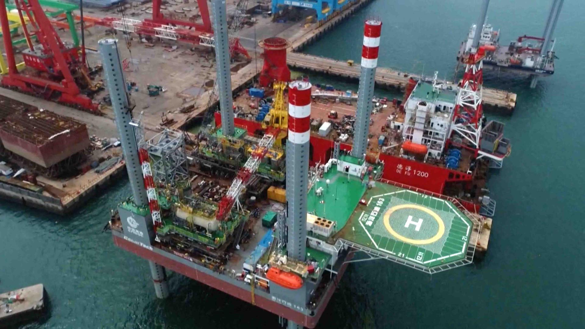 China's first mobile offshore self-installing oil rig put into use - CGTN