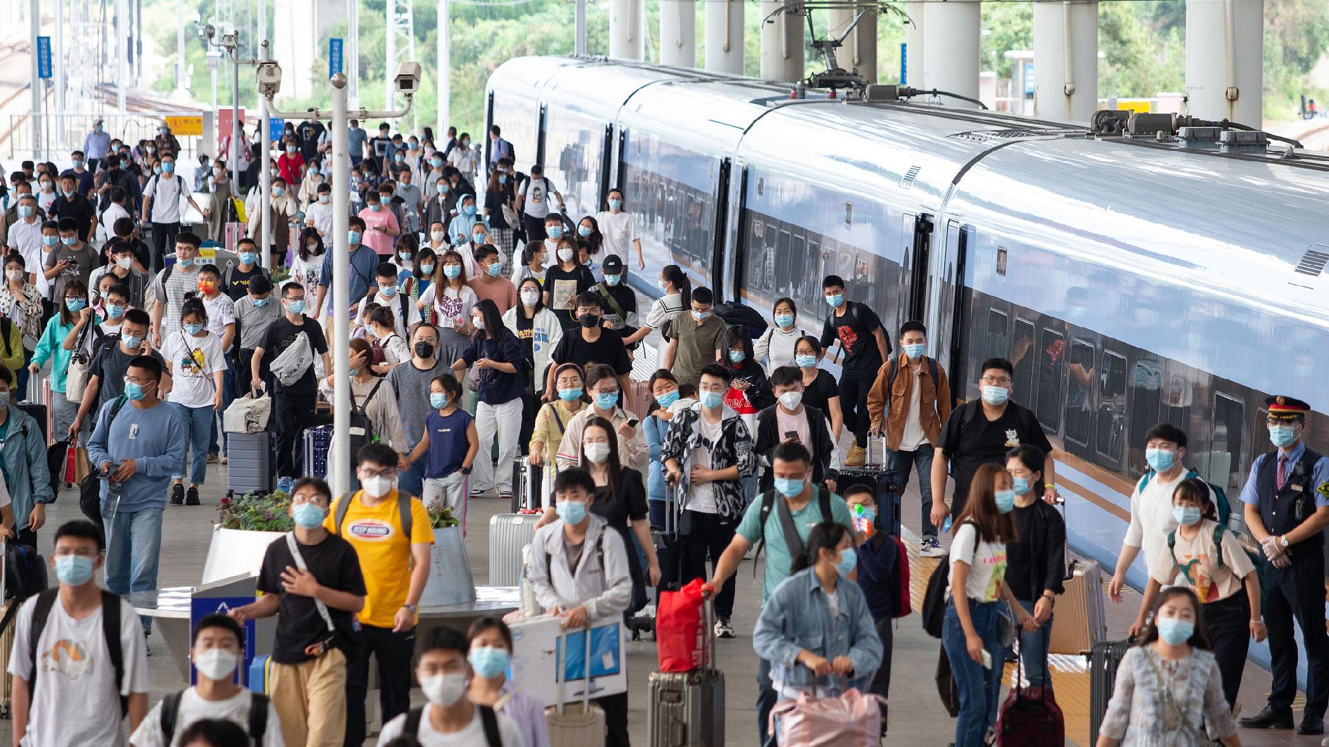 China's public transportation sees return passenger flow peak - CGTN