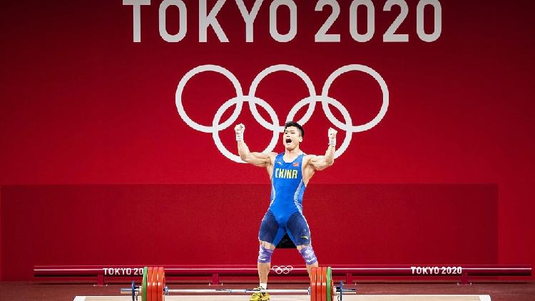 China's weightlifting champion Shi ready for Olympic gold in Tokyo - CGTN