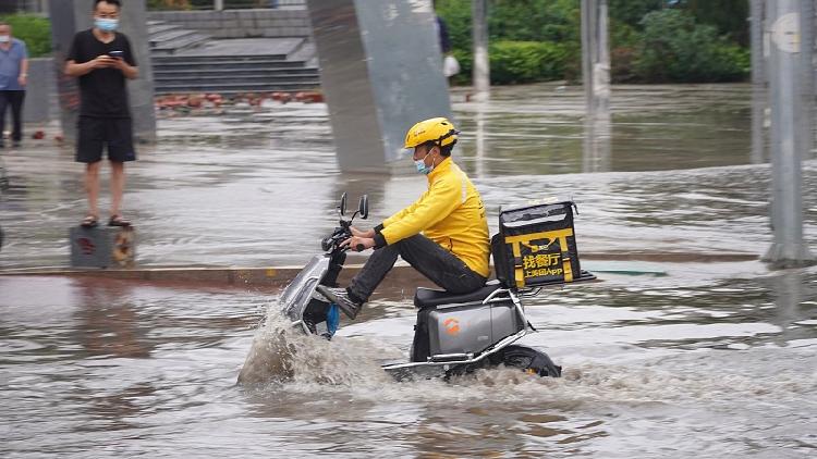 Rescuers save 20 people stranded after heavy rains in NW China - CGTN