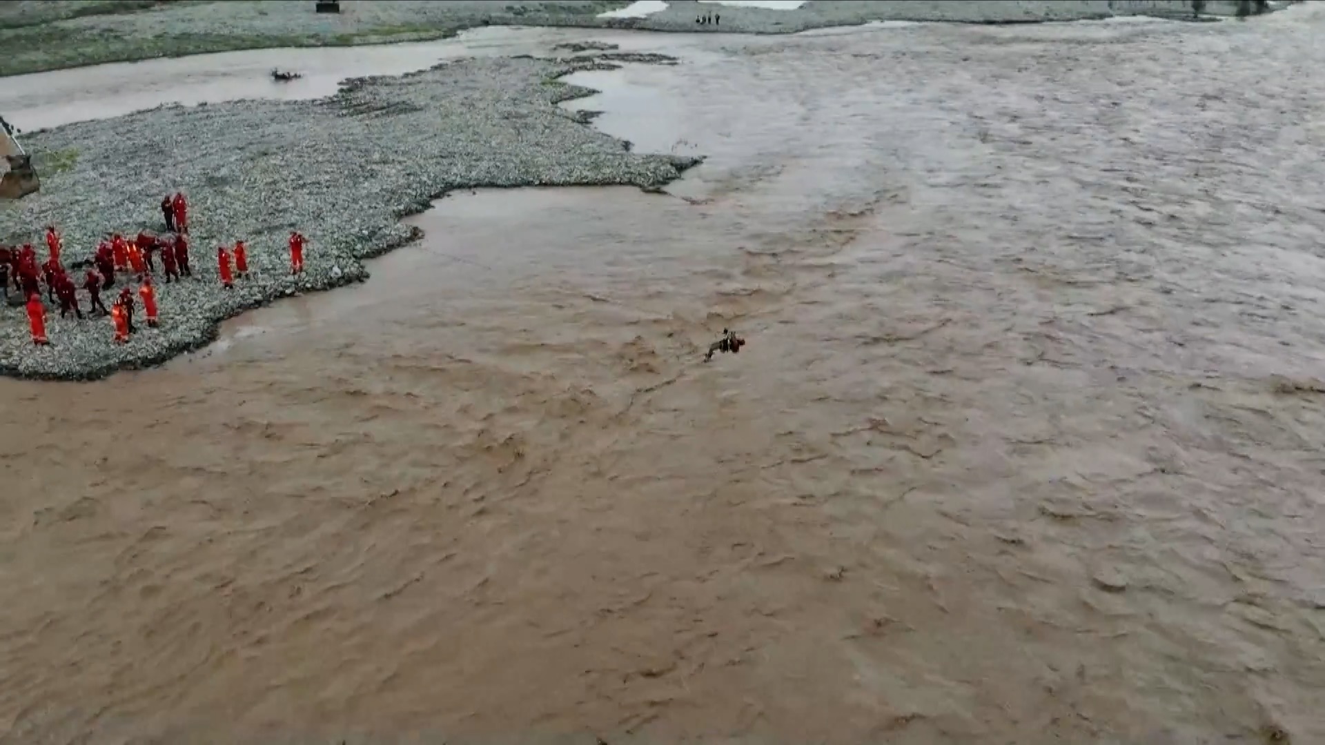 2-men-trapped-on-islet-amid-heavy-rain-rescued-in-gansu-cgtn