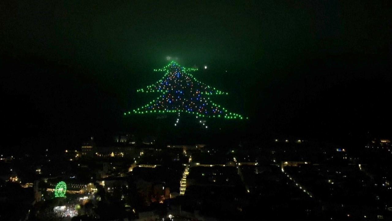 World's largest Christmas tree lit up in Italy CGTN