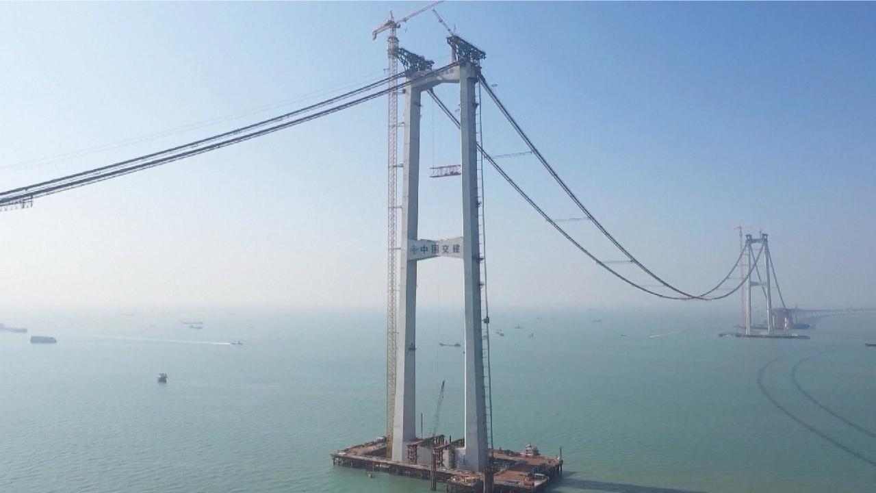 Chinese workers propel mega bridge project during Spring Festival - CGTN
