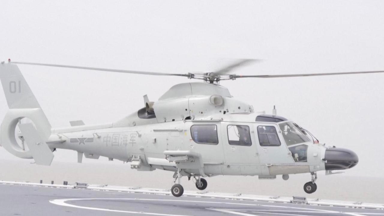 Chinese navy helicopter regiment trains to hone combat capacity - CGTN