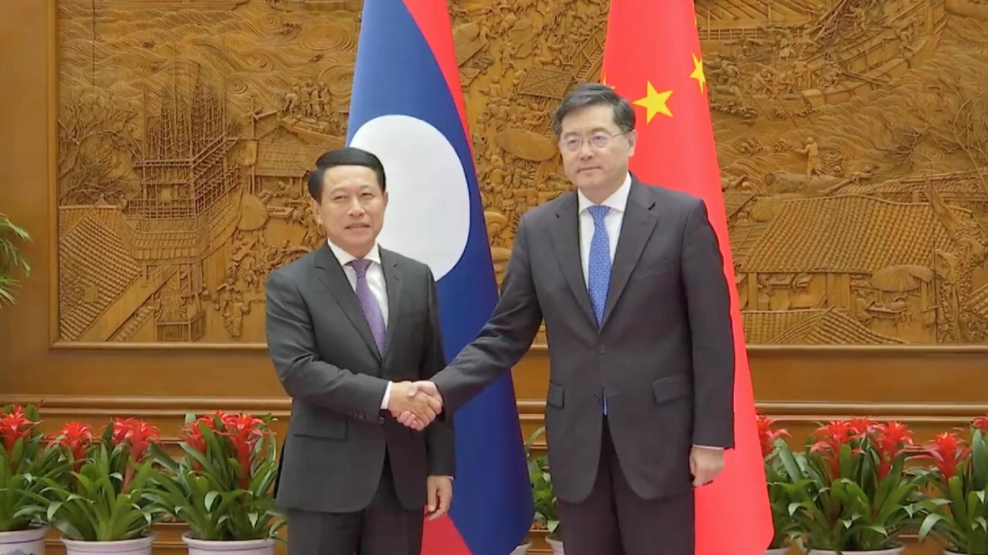 Chinese, Lao FMs vow to strengthen cooperation, promote development - CGTN