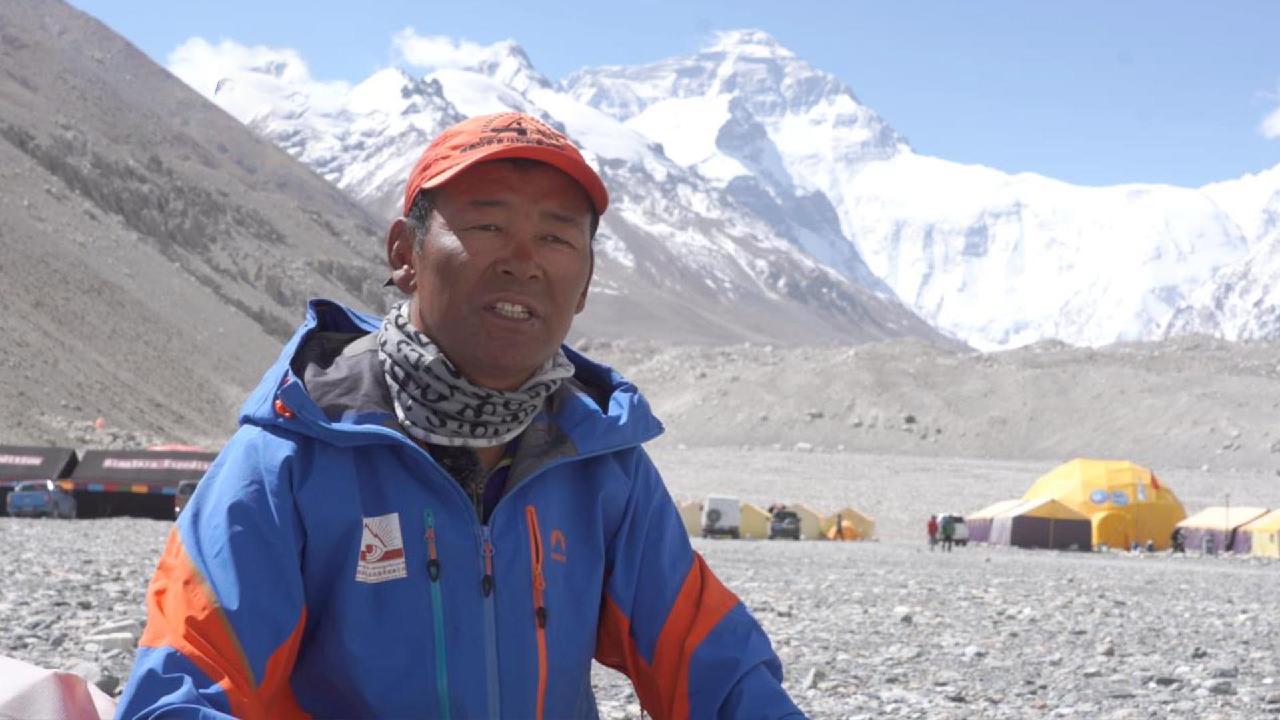 Mountaineers to help scientists collect data on world's tallest peak - CGTN