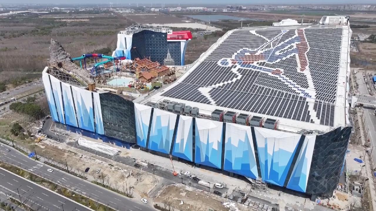 World's largest indoor ski resort in Shanghai nears completion - CGTN