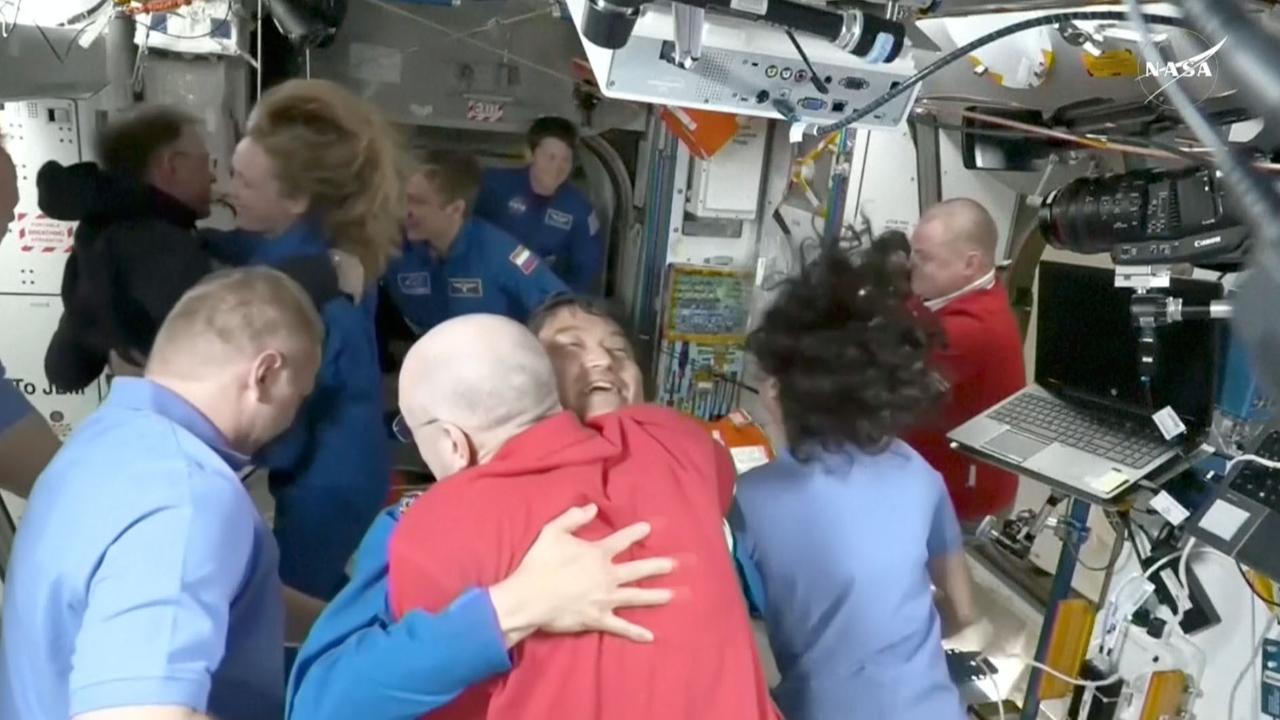 NASA's marooned astronauts greet their freshly arrived substitutes