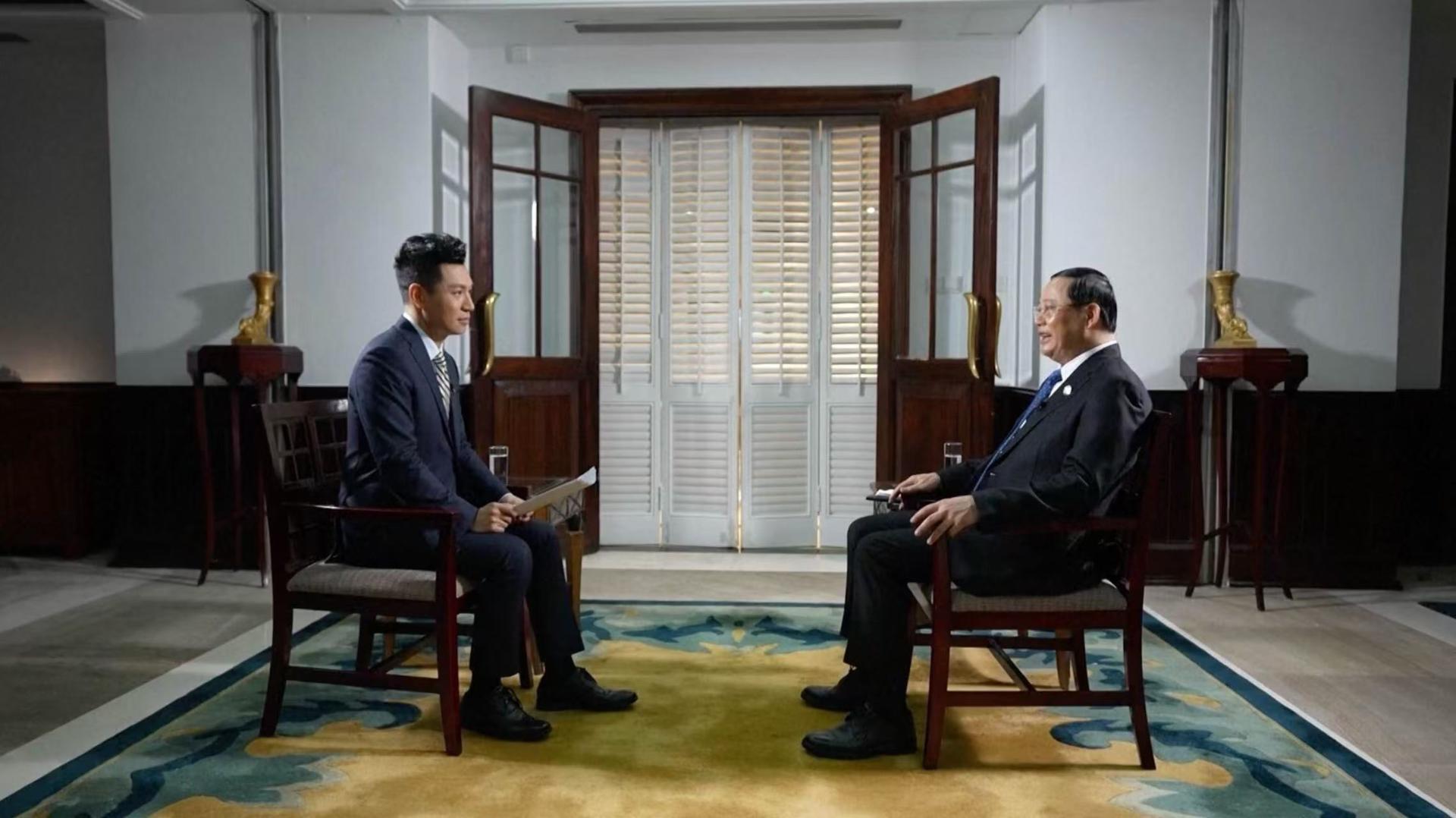 Lao PM looks forward to deepening AI cooperation with China - CGTN