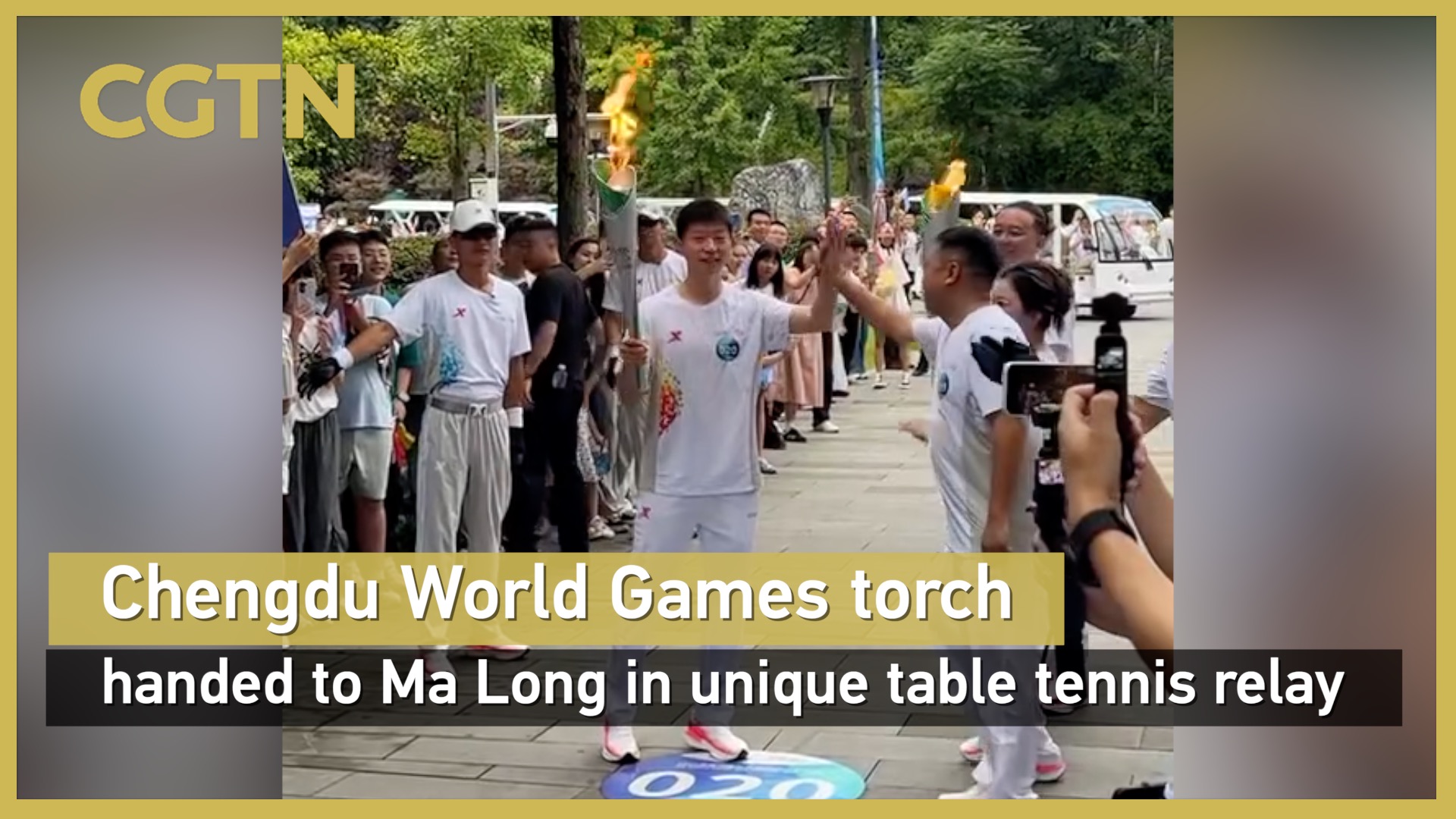 Chengdu Games torch passed to Ma Long in unique table tennis relay