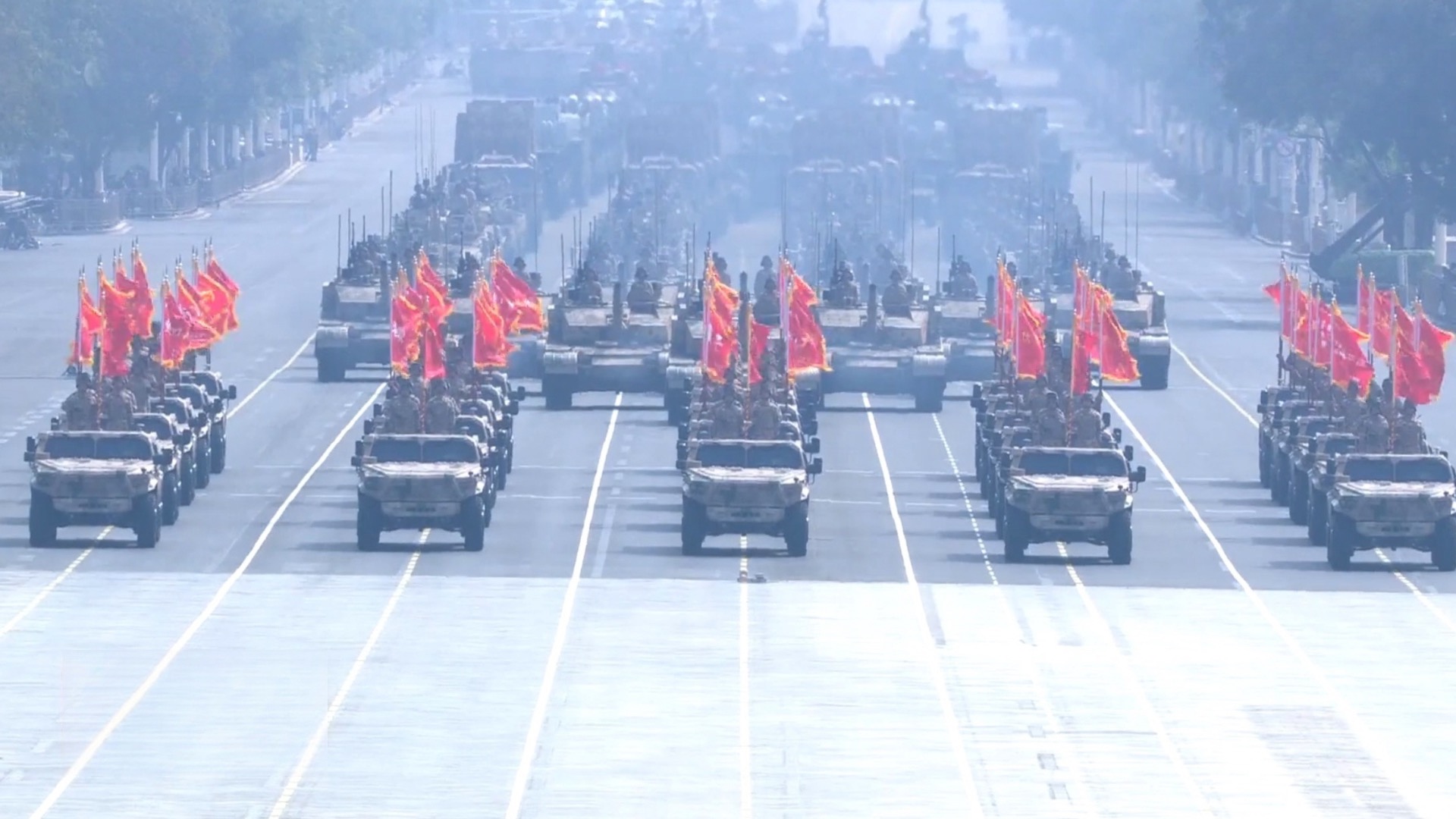 Banner Formation leads armament groups in V-Day parade