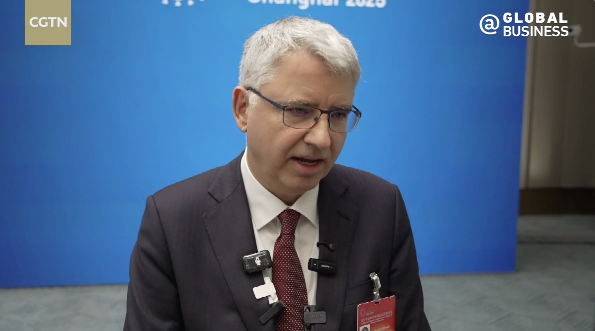 Why do multinational giants continue to invest in China?