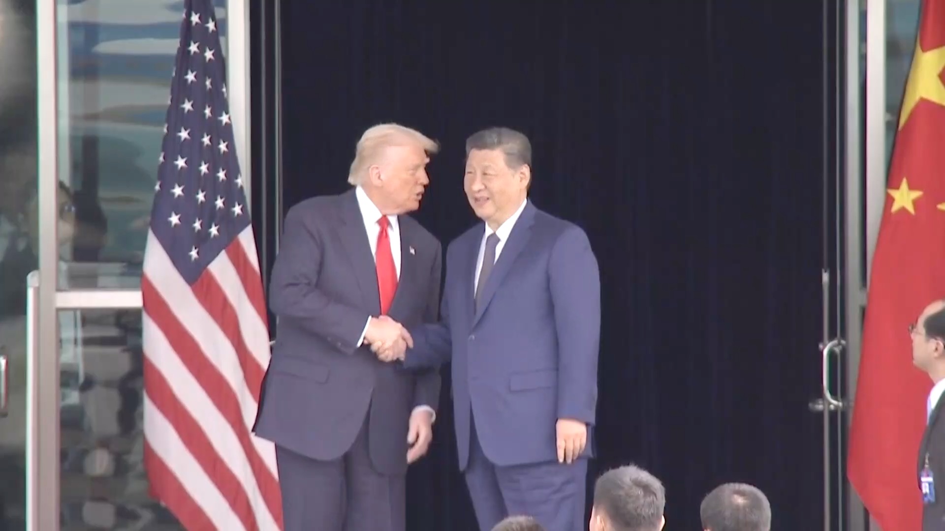 Xi Jinping, Donald Trump shake hands, wave goodbye after meeting