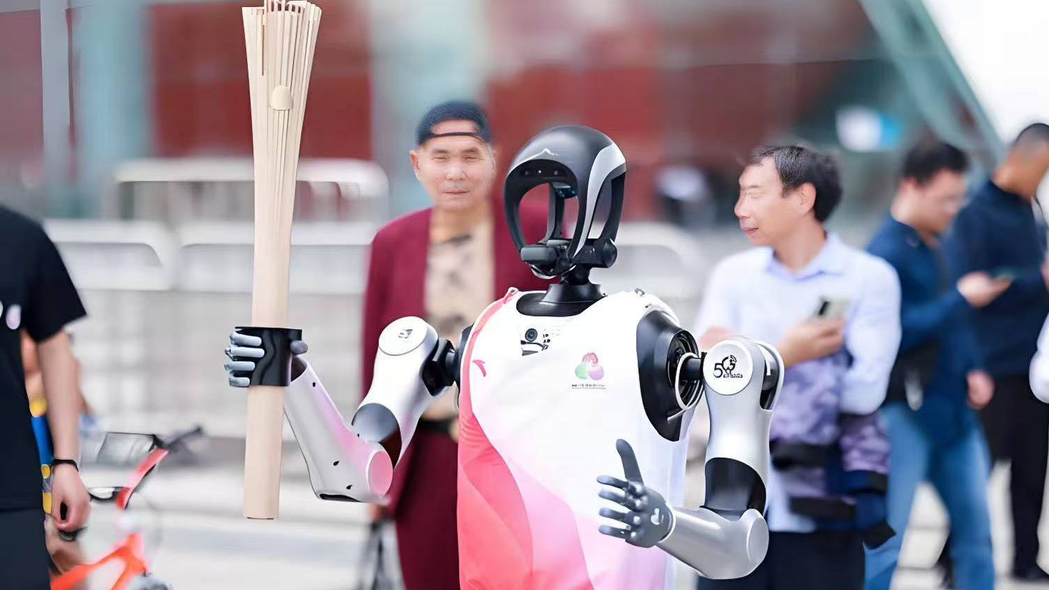 Developer discusses significance of robot Kuavo's torch relay debut