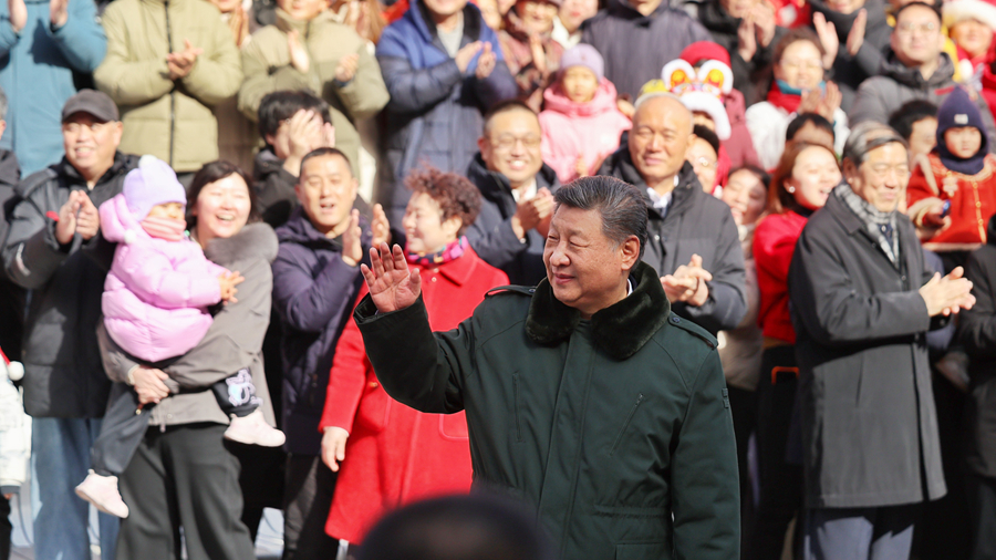 China's President Xi Jinping visits Beijingers before Spring Festival