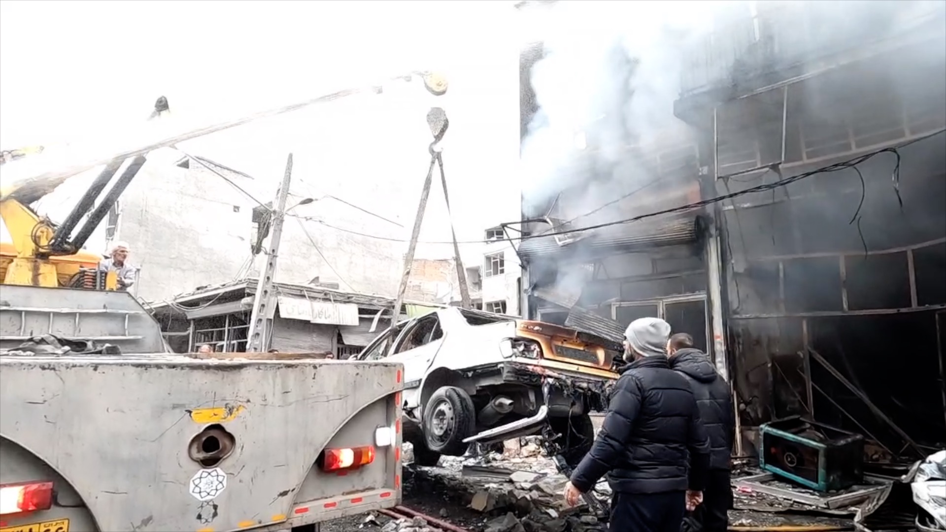 Stringer Dispatch: Residential area bombed in Tehran, dozens injured