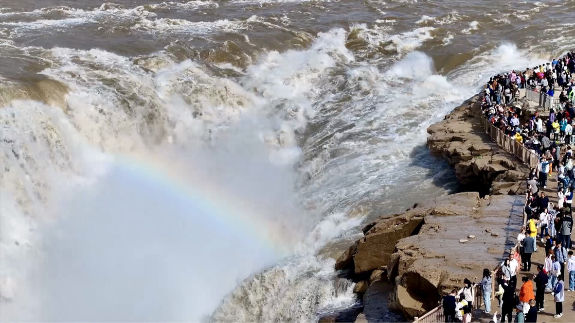 Chasing rainbows at Hukou Waterfall during Qingming Festival