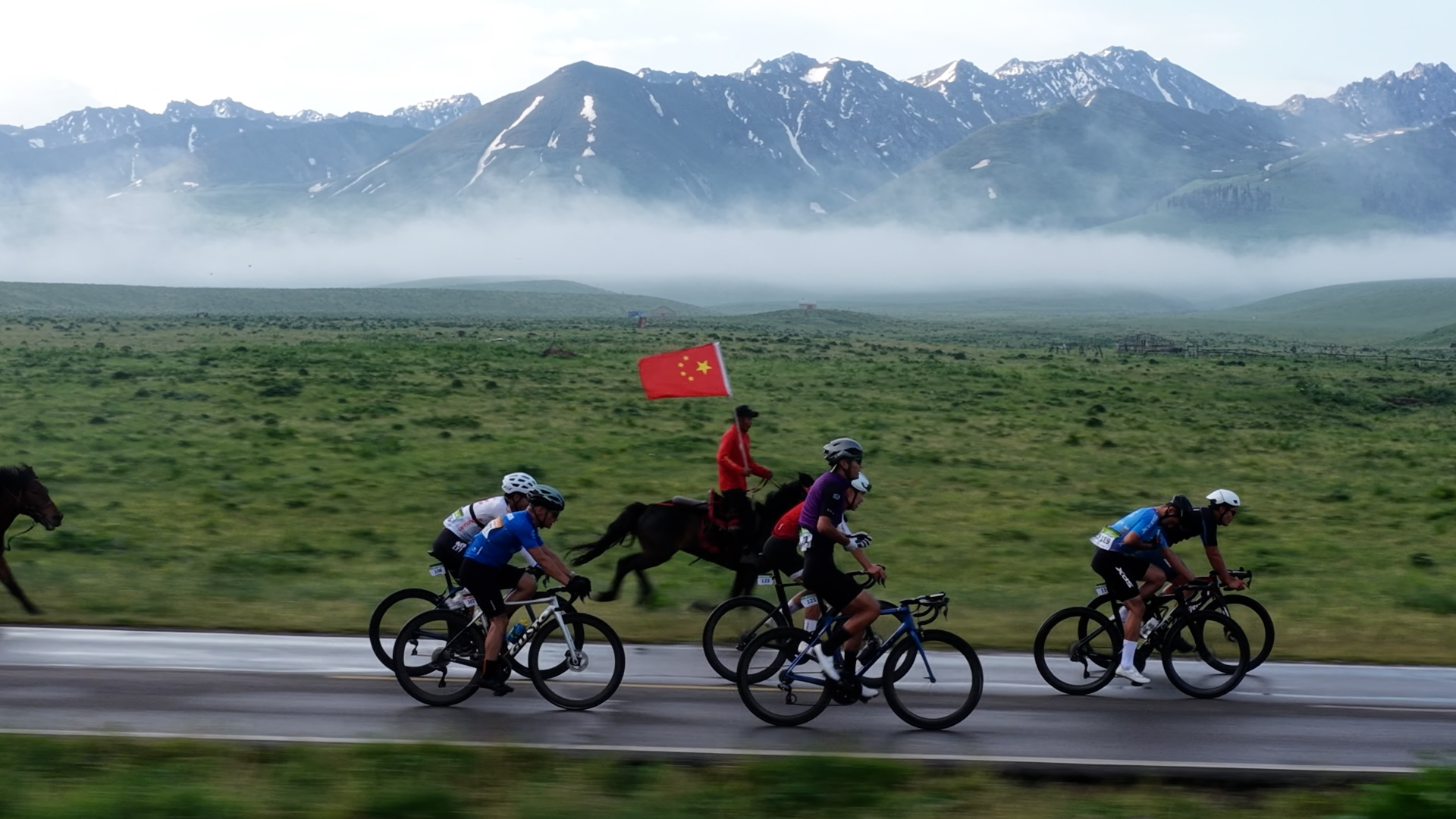 Cyclists race through Xinjiang's breathtaking Nalati Grassland