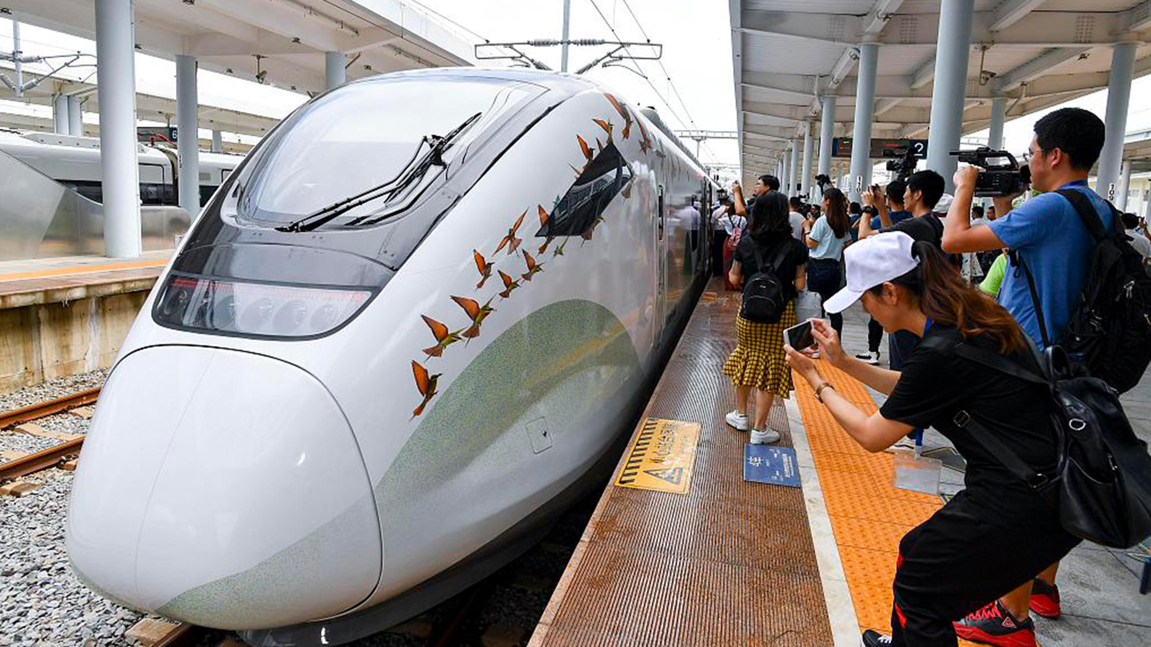 China's first intercity trains using high-speed rail open in