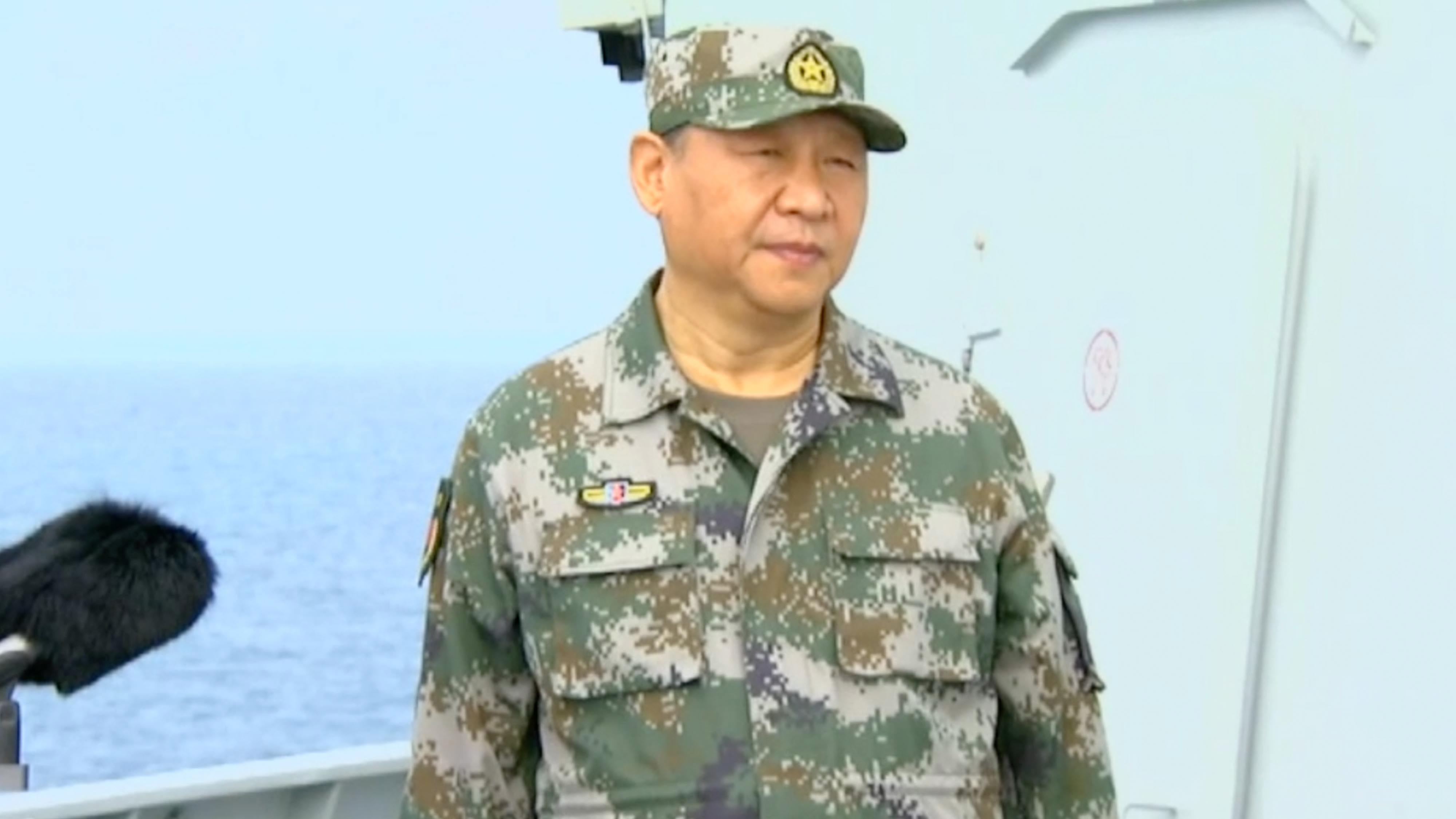 Chinese President Xi Jinping on Thursday conducted a naval inspection ...