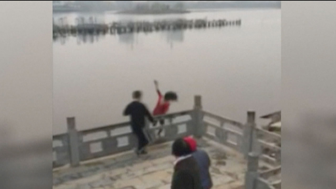 Passersby rescue woman from two suicide attempts in a lake in east ...